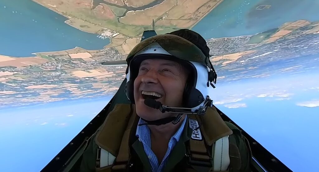Graham upside down in a Supermarine Spitfire